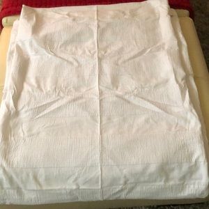 White cloth shower curtain